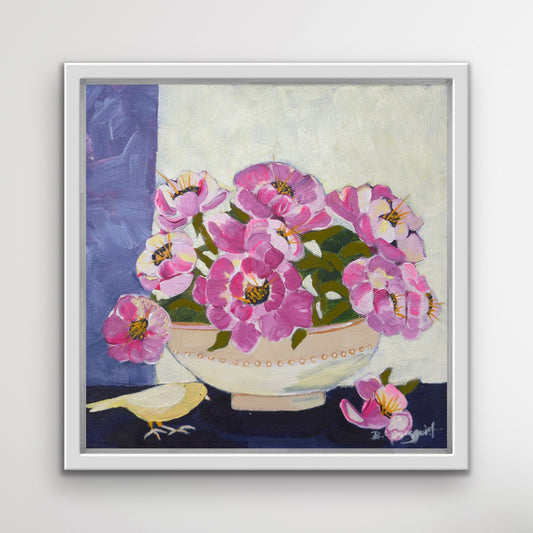 Framed original artwork of pink flowers in a bowl with a bird on a white wall for home decor and art collectors