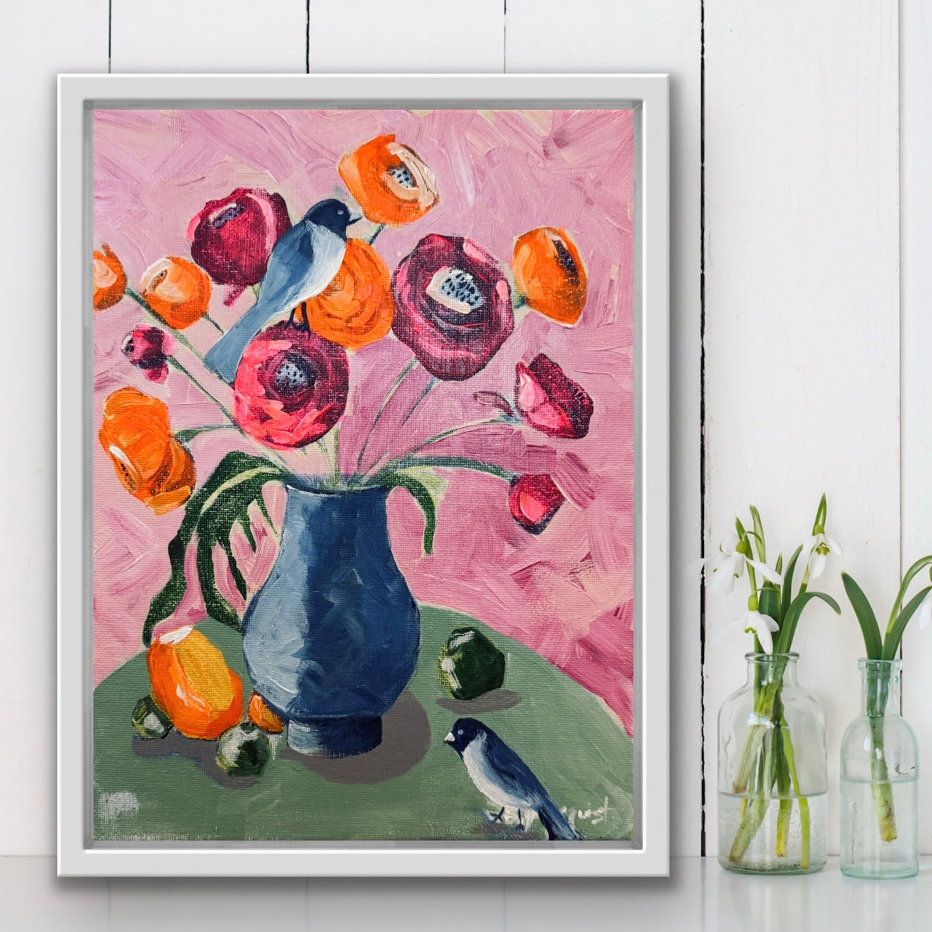 Framed painting of a vase with flowers and birds on a pink background home decor