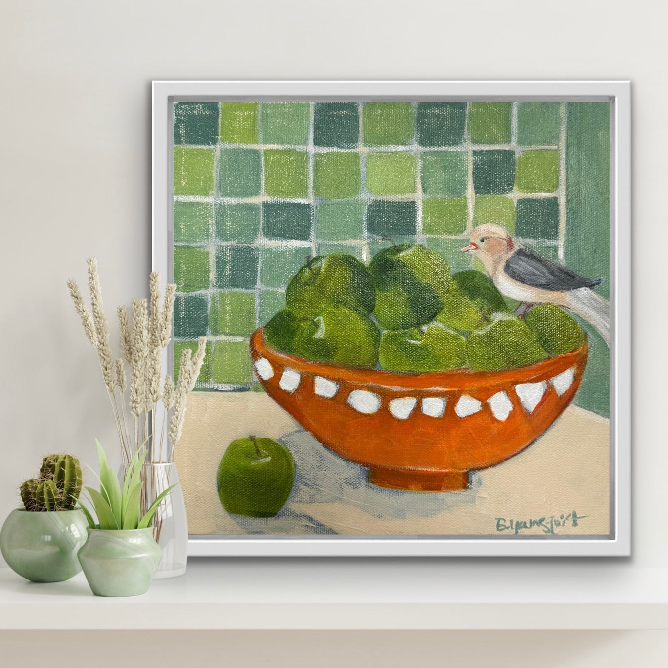 Framed originalo artwork of a bowl of apples with a bird on a tiled wall background for interior designers.