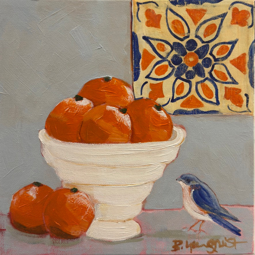 Original acrylic still life painting with oranges in a bowl, a bird, and a decorative tile on a blue gray background.