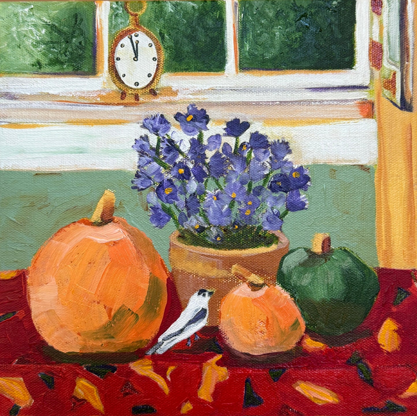 Original small still life painting with pumpkins, a bird, and a pot of purple flowers on a table by artist Bernadette Youngquist.